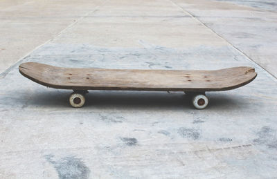 Wooden skateboard on street