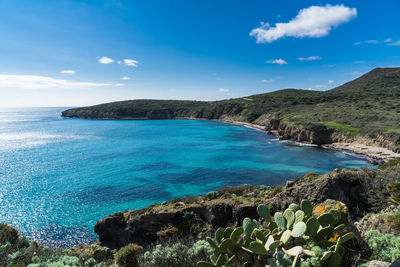 Scenic view of bay against sky