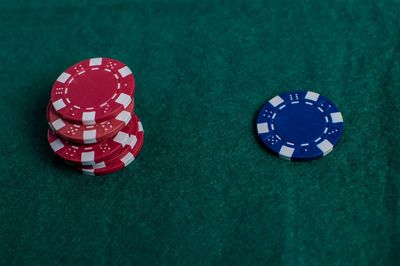 High angle view of gambling chips on table