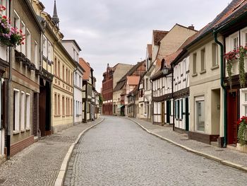 Street amidst buildings in town