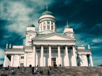 Low angle view of people outside helsinki cathedral
