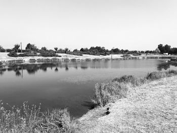 Scenic view of lake against clear sky