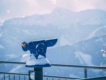 Low angle view of snow on mountain against sky
