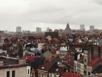 High angle view of buildings in city against sky