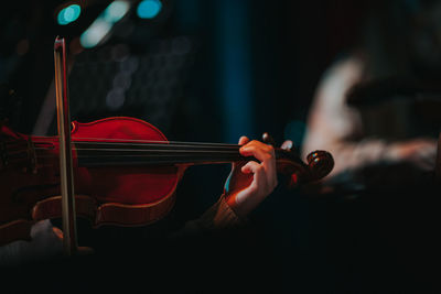 Close-up of woman playing violin