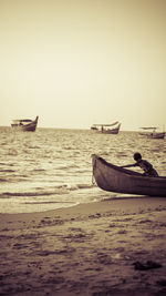 Boats moored in sea