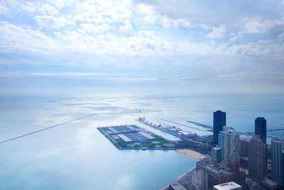 Aerial view of cityscape against sky