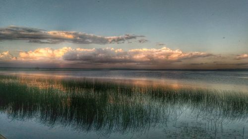 Scenic view of sea against sky during sunset