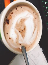 Close-up of cappuccino on table