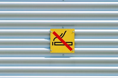 Close-up of no smoking sign