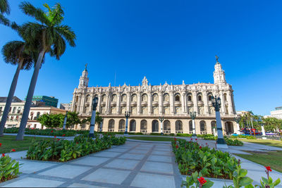 Facade of historic building against blue sky