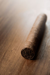 High angle view of cigarette on table