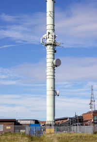 Communications tower against sky