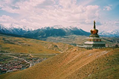 High angle view of temple against cloudy sky