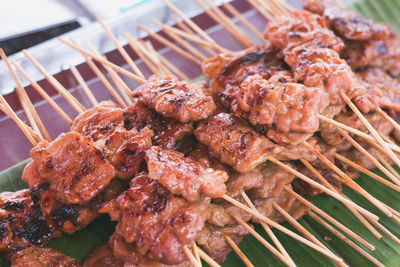 Close-up of meat on barbecue grill