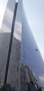 Low angle view of modern buildings against sky