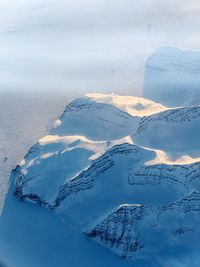 Aerial view of snow covered mountain