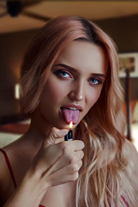 Portrait of beautiful woman at home