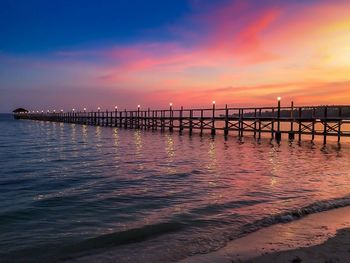 Scenic view of sea against sky at sunset