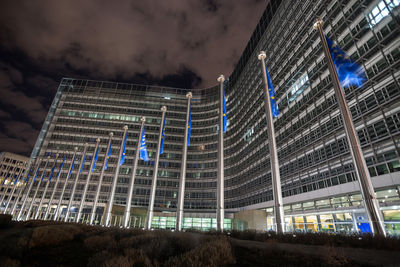 Low angle view of illuminated buildings against sky