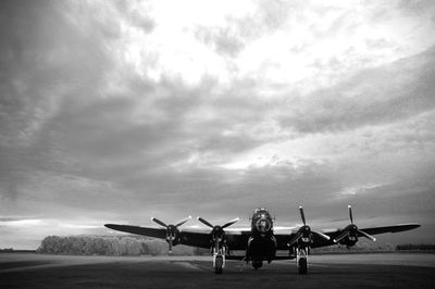 Lancaster bomber against sky