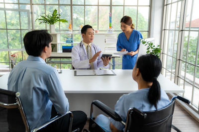 Business colleagues working in office