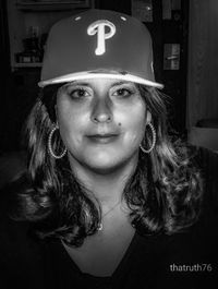 Portrait of young woman in hat