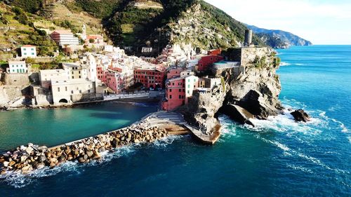 Scenic view of sea and buildings