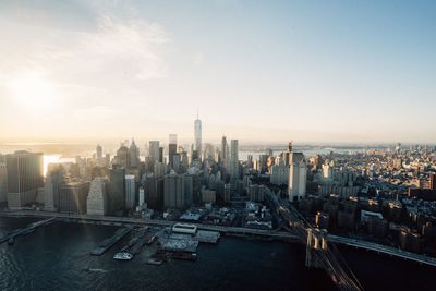 Aerial view of city buildings during sunset