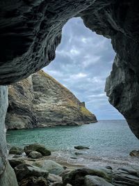 Scenic view of sea against mountain