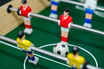Close-up of figurine on soccer ball