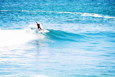 Man surfing in sea