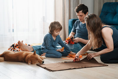 Group of people sitting on floor