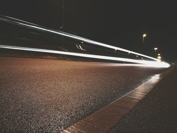 Light trails against sky at night