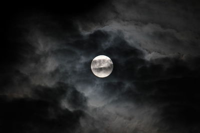 Low angle view of moon against sky