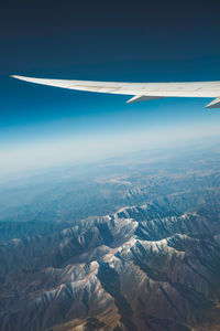 Aerial view of mountains against sky