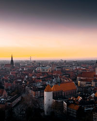 High angle view of townscape against sky during sunset