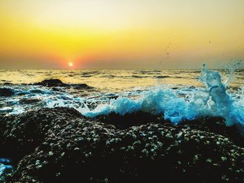 Scenic view of sea at sunset