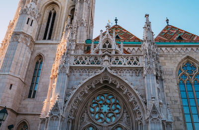 Low angle view of ornate building against sky