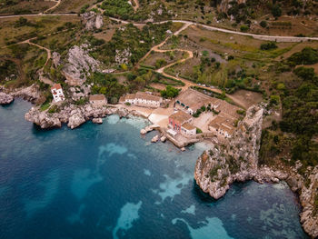 High angle view of rocks in sea