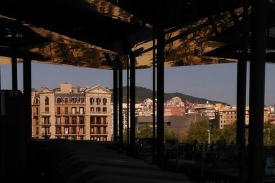 Buildings in city against sky