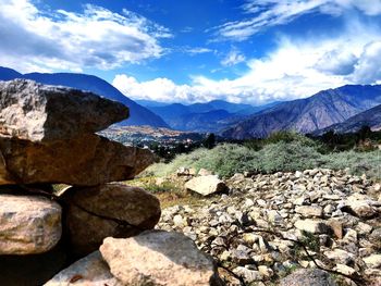 Rocks on mountain against sky