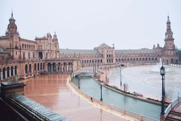 architecture, built structure, building exterior, clear sky, water, connection, bridge - man made structure, transportation, travel destinations, famous place, river, tourism, travel, international landmark, arch, city, canal, copy space, incidental people, bridge