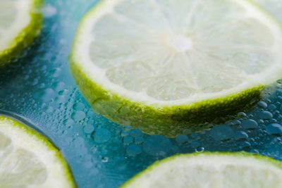 Detail shot of lime slices in water