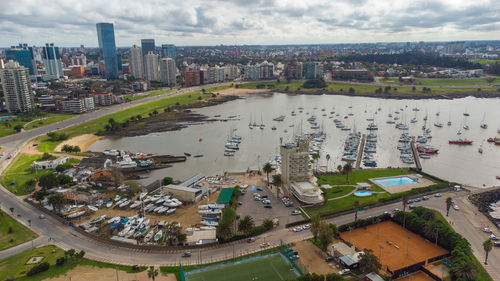 High angle view of buildings in city against sky