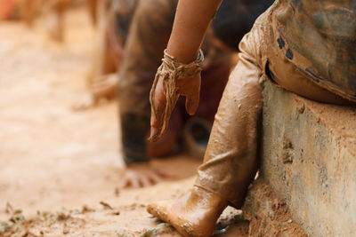 Low section of person wearing shoes