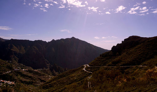 Scenic view of mountains against sky