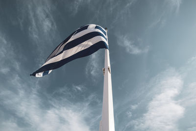 Low angle view of flag against sky