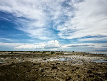 Scenic view of land against sky
