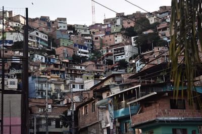 Buildings in city against sky